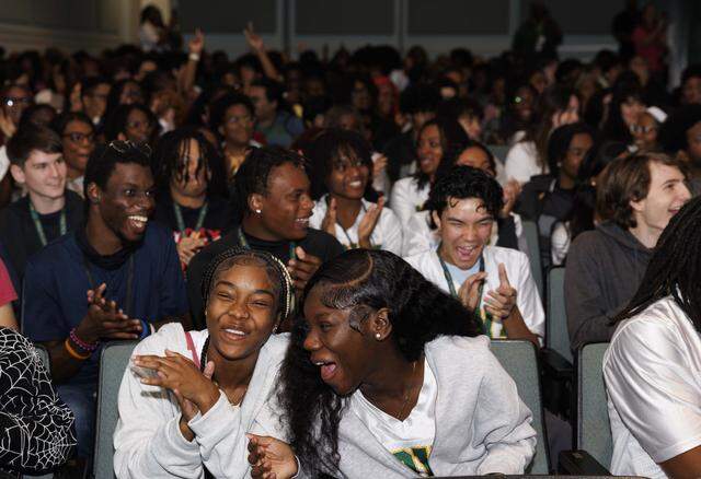 The senior class reacts to the news that their prom tickets would be free during a ceremony announcing that Becca’s Closet and Macy’s donated $65,000 so that prom would be free for students on Thursday, March 26, 2026, at Nova High School in Davie, Fla. “We weren’t hitting that mark [with fundraising] and sometimes kids can’t participate in things because of cost and now not only can they go to prom for free, but then can go to Becca’s closet and get a dress. Being able to come together as a class for prom and take that concern away means the world,” said Jayla Huntley-Murphy, class treasurer.